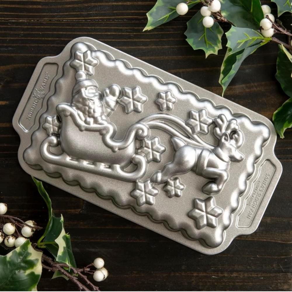 NWOT never used Nordic Ware Santa’s Sleigh Loaf Pan